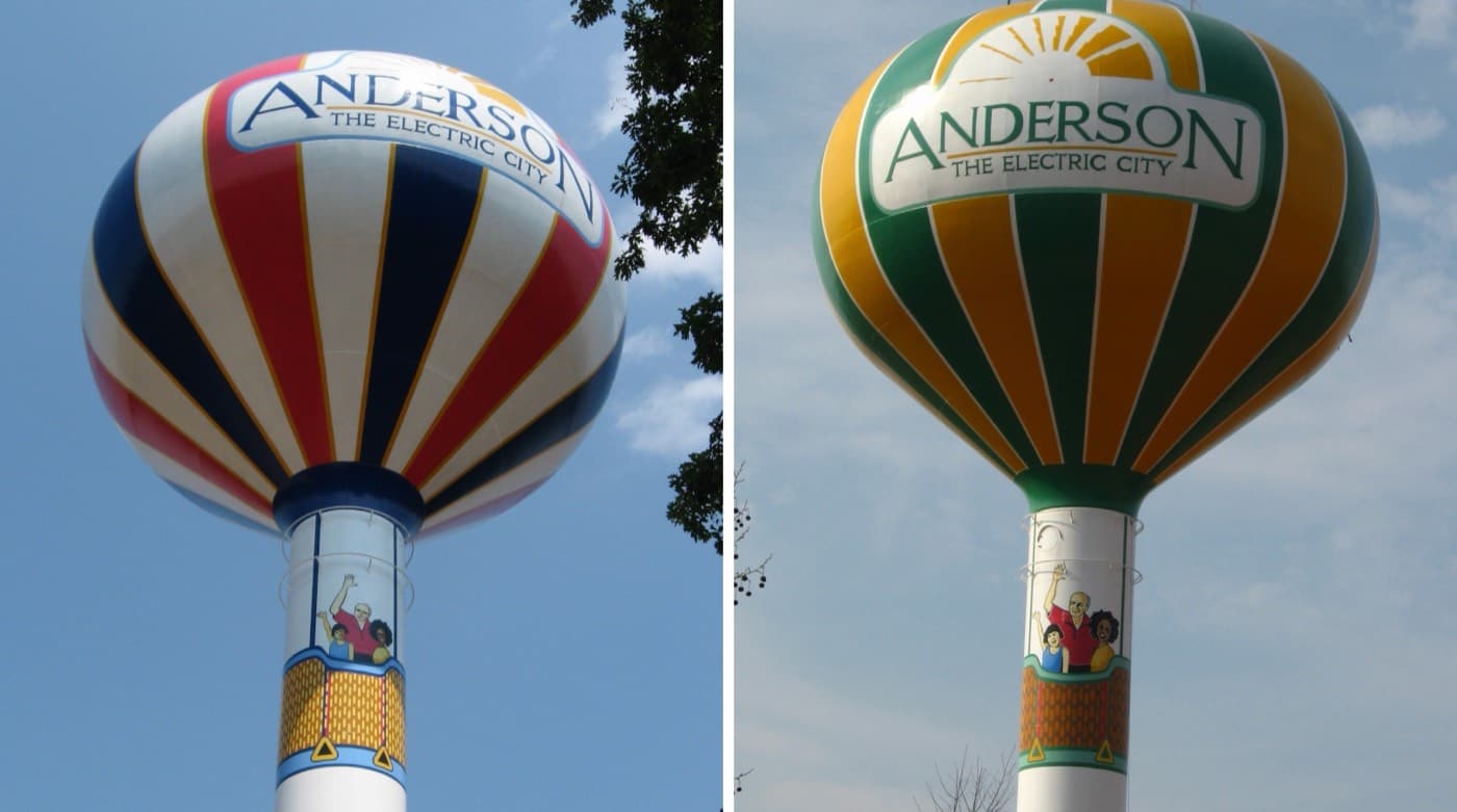 Side-by-side photos of Anderson's two hot-air-balloon water tanks, one red, white and blue and one green and gold, each with the 'Anderson, The Electric City' logo