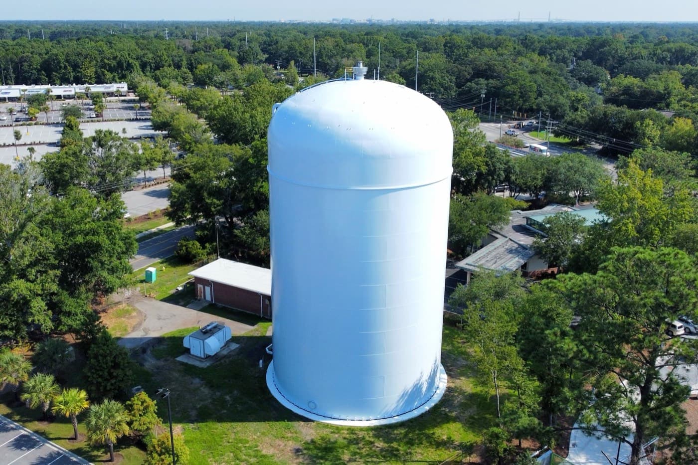 Charleston Water's Grimball Road standpipe water tank in Charleston, SC, freshly coated white, seen from above