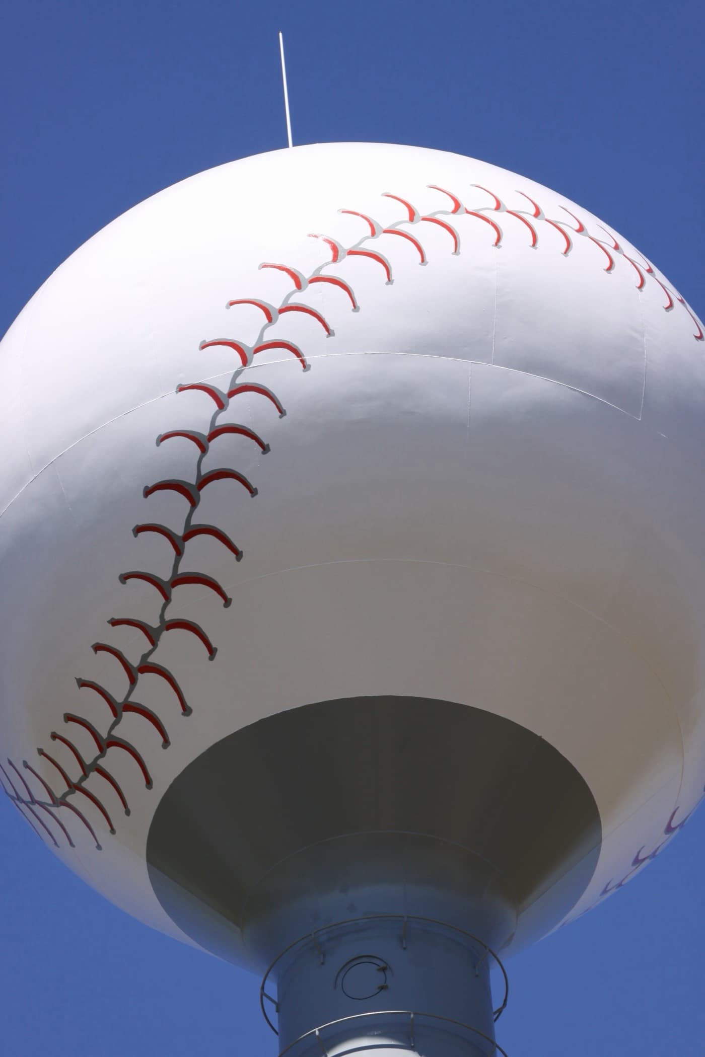 York County water tank painted as a giant baseball with red stitching against a blue sky, Fort Mill, SC